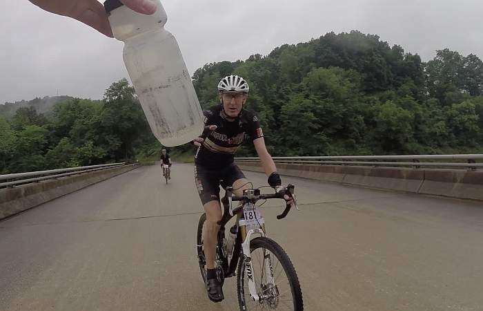 K-Dogg receiving a bottle hand-up from JOM.