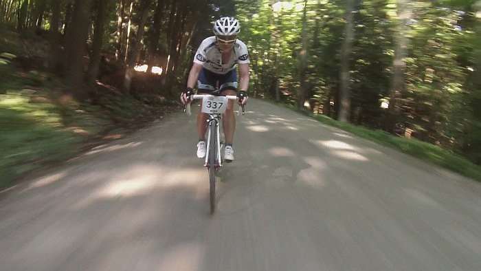Amy on my wheel as I bombed a descent... she's on 25mm tires. Impressive skills.