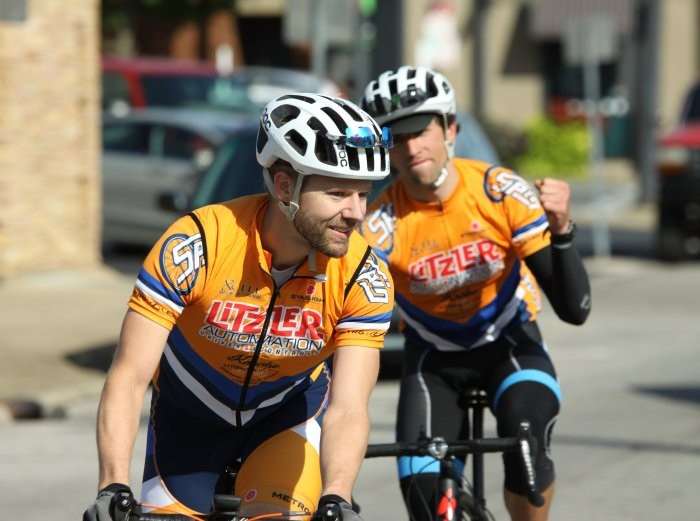 Jeremy Paul (foreground) and Bradley Cramer (back) leading the winning team in.