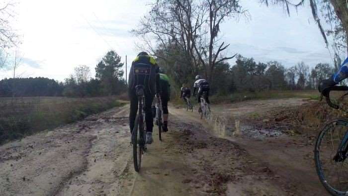 The lead group on soggy roads.