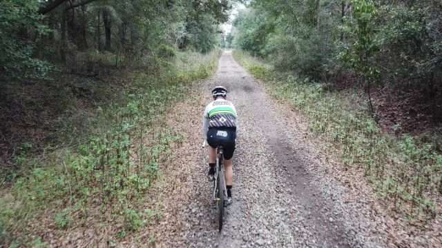 riding a bicycle on a disused railway line